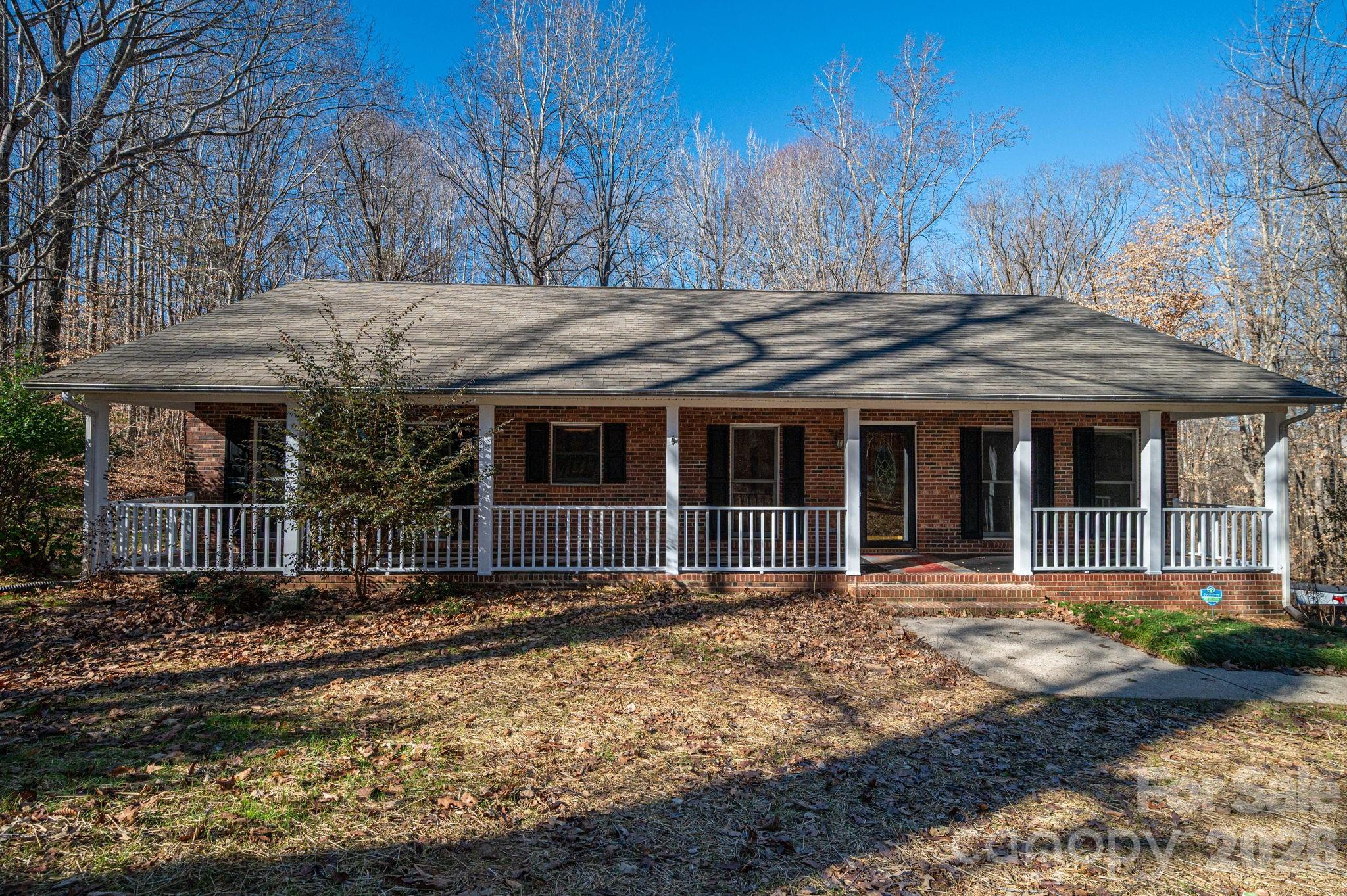 480 South Ingleside Farm Road Iron Station, NC 28080 - Photo 1 of 42 a front view of a house with garden