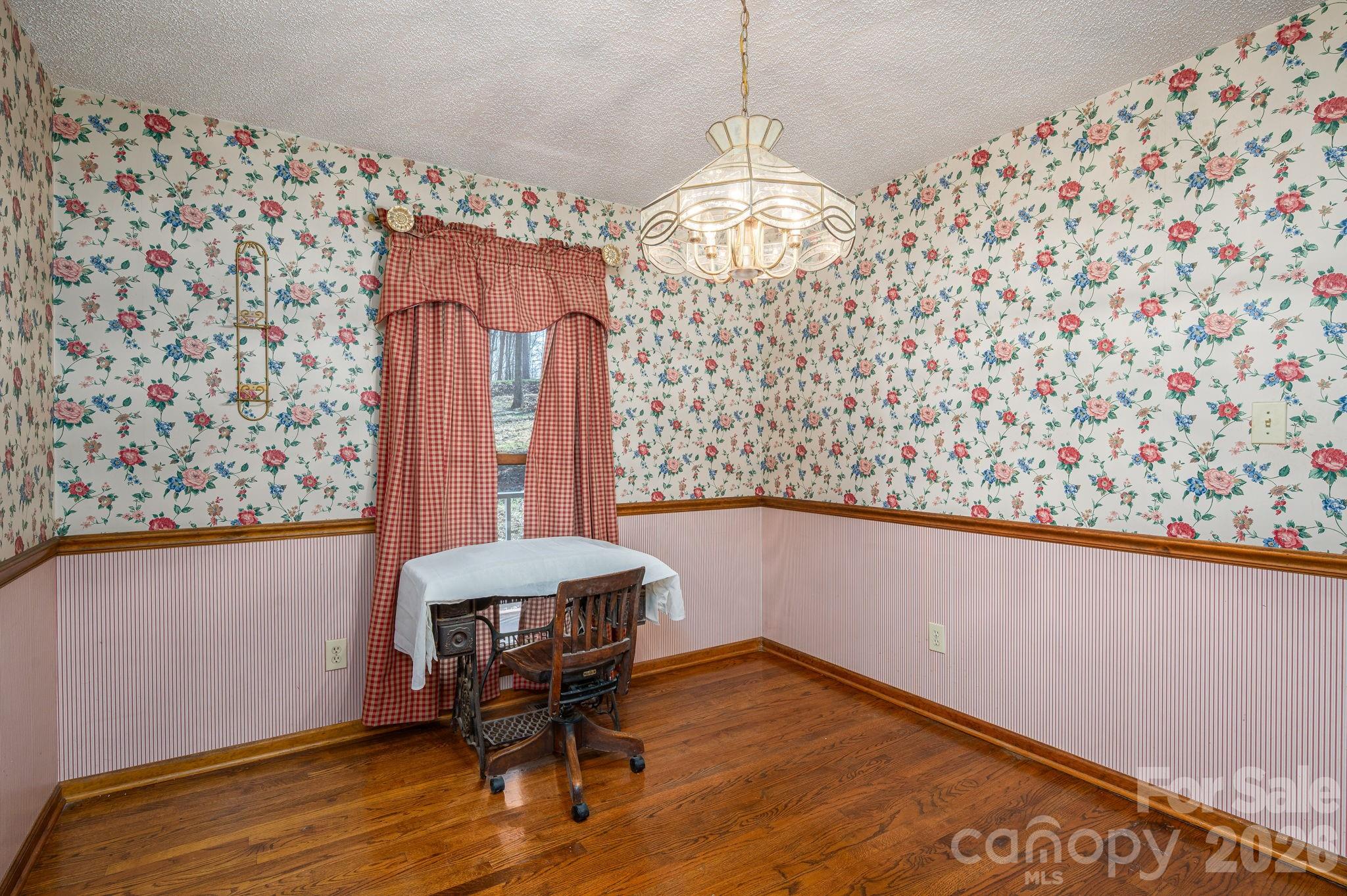 480 South Ingleside Farm Road Iron Station, NC 28080 - Photo 12 of 42 a view of a room with furniture and wooden floor