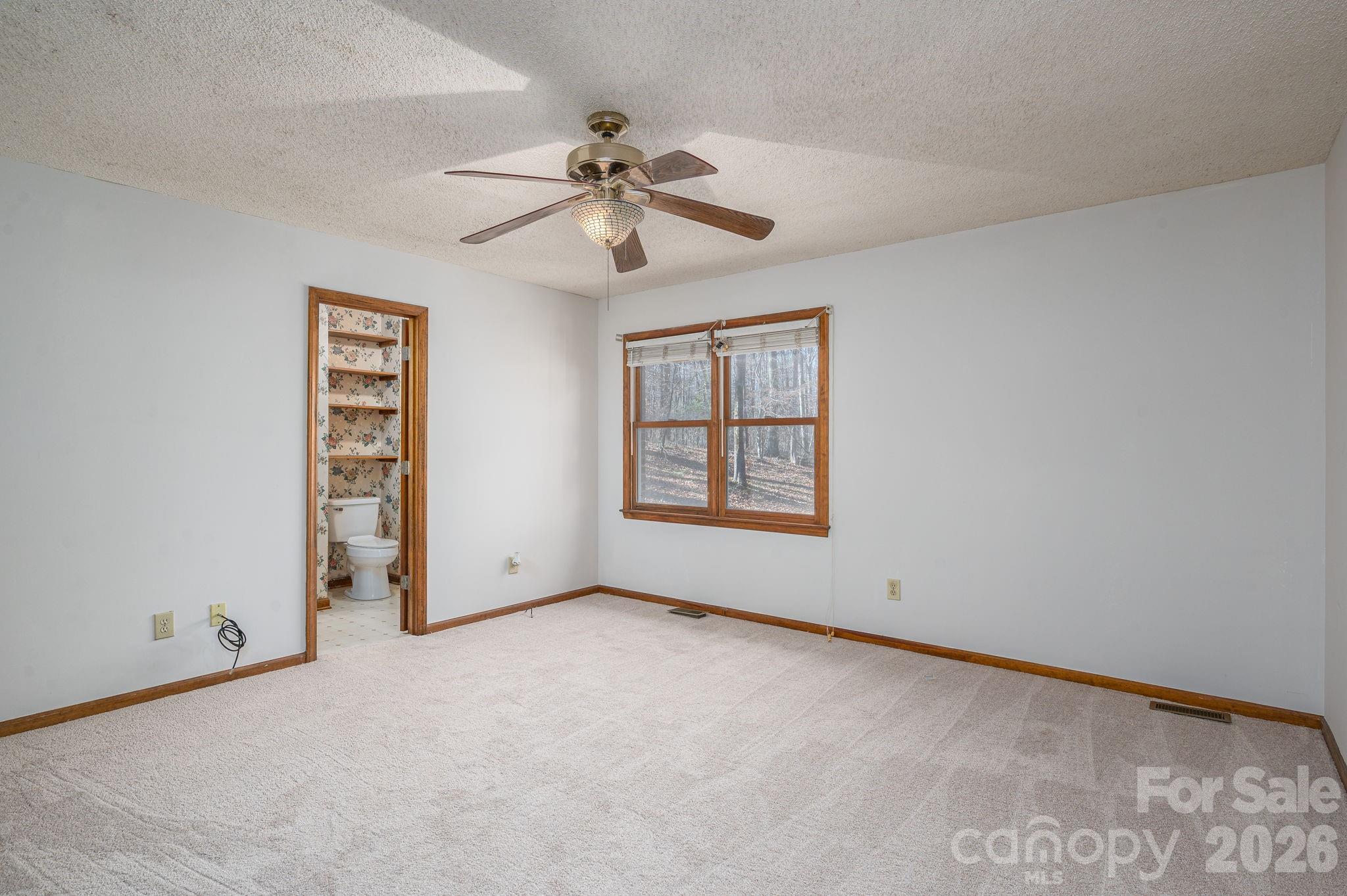 480 South Ingleside Farm Road Iron Station, NC 28080 - Photo 13 of 42 a view of an empty room with a window