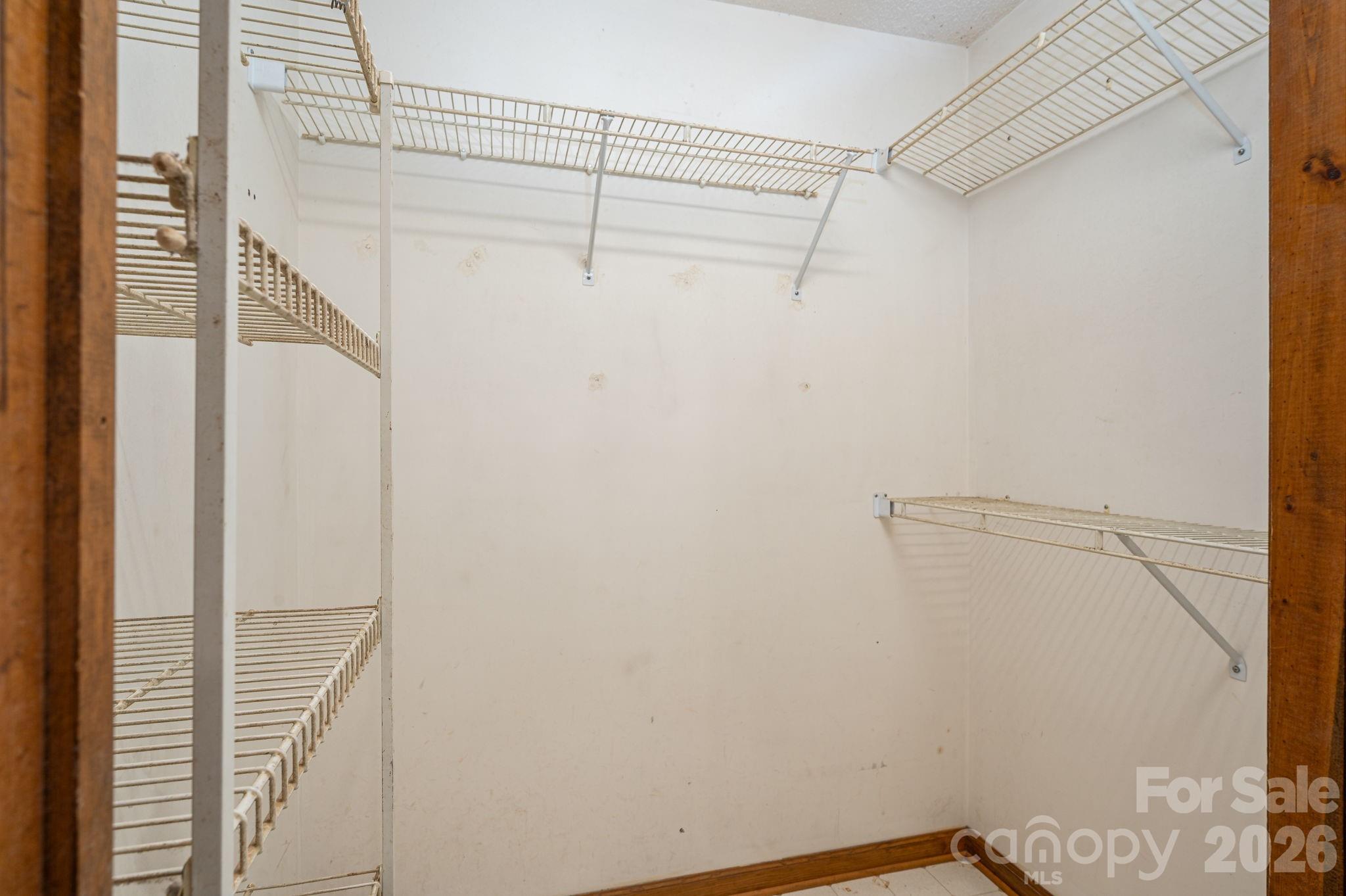 480 South Ingleside Farm Road Iron Station, NC 28080 - Photo 17 of 42 a view of a room with racks on the wall
