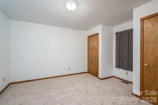 an empty room with closet