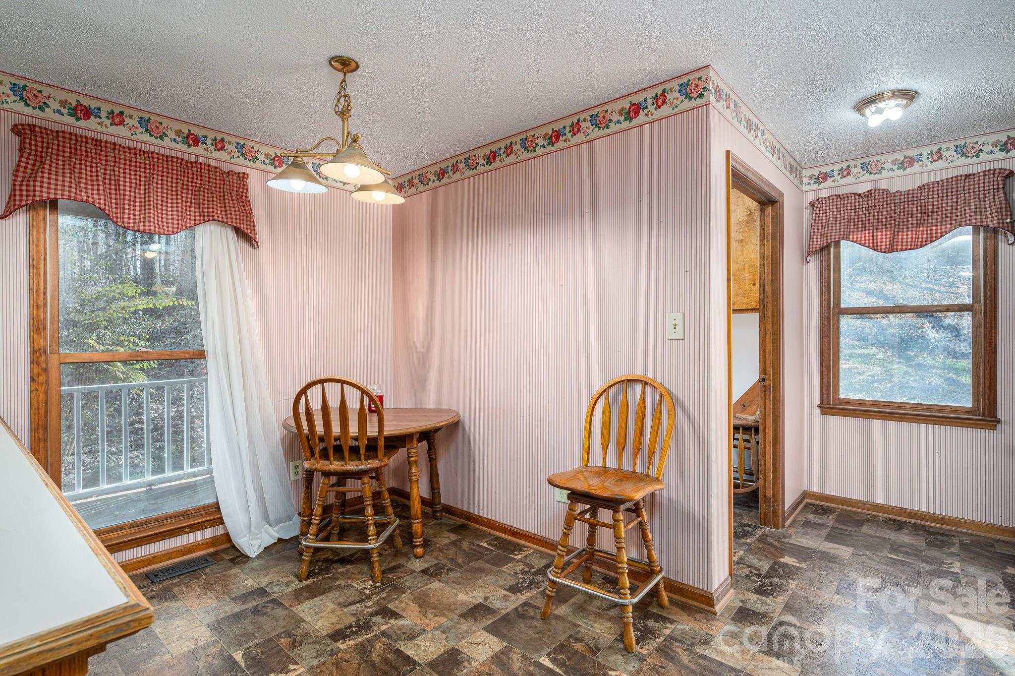 480 South Ingleside Farm Road Iron Station, NC 28080 - Photo 10 of 42 a view of a livingroom with furniture and windows