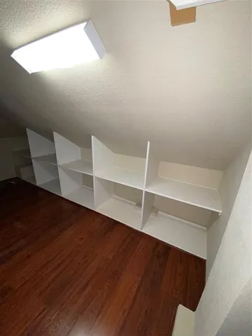 a bathroom with a bathtub and toilet