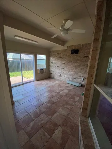 a view of a hallway with windows