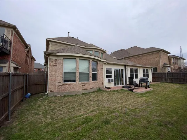a front view of a house with patio