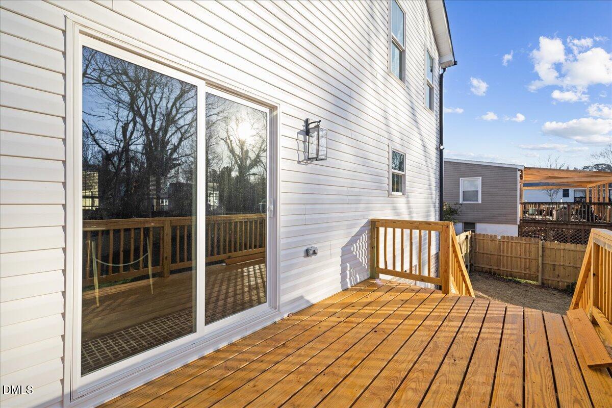 617 North 3rd Street Mebane, NC 27302 - Photo 40 of 50 a view of a balcony with wooden floor