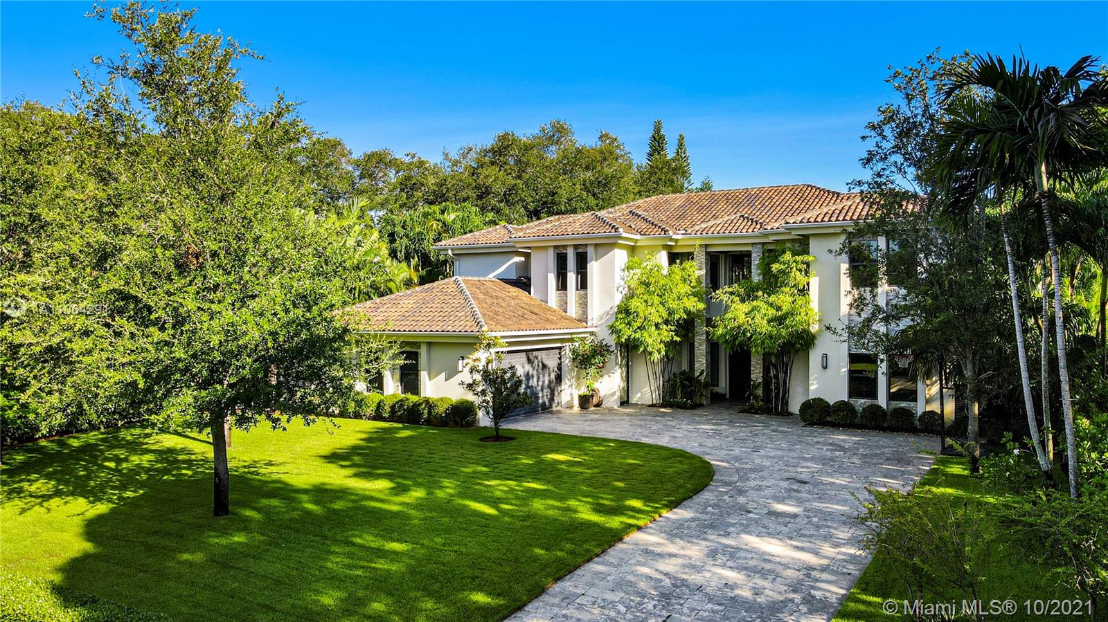 575 Sabal Palm Road Miami, FL 33137 - Photo 1 of 1 a front view of a house with garden