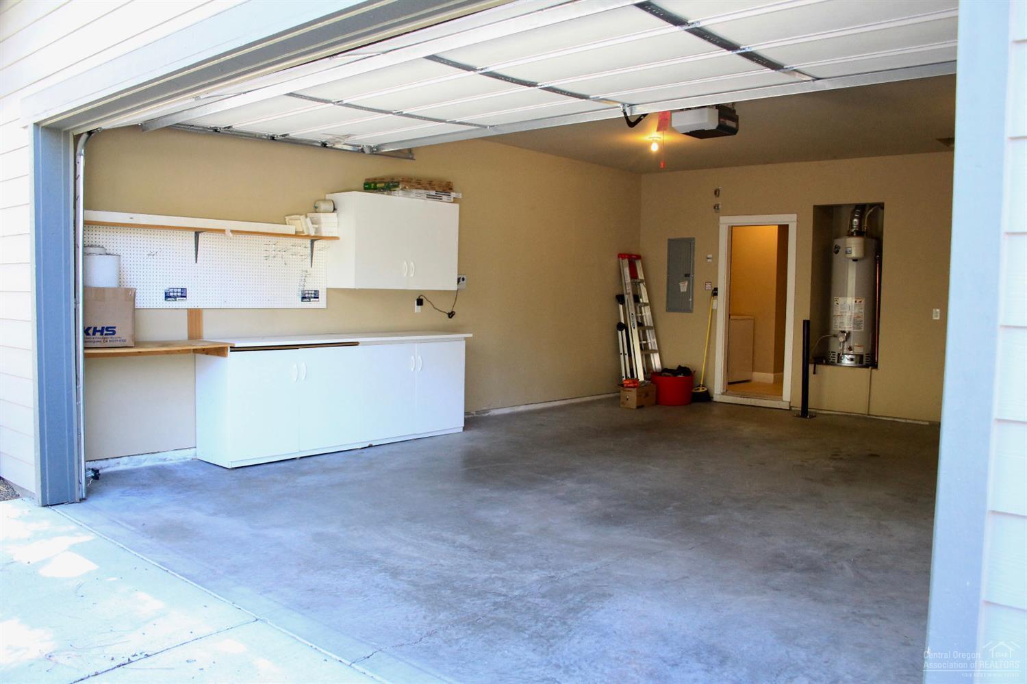 19459 Blue Lake Loop Bend, OR 97702 - Photo 9 of 19 a view of kitchen and utility room