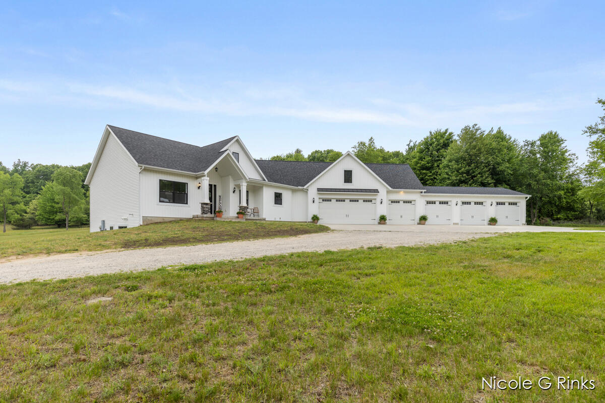 9860 Button Road Belding, MI 48809 - Photo 1 of 63 9860 Button Exterior