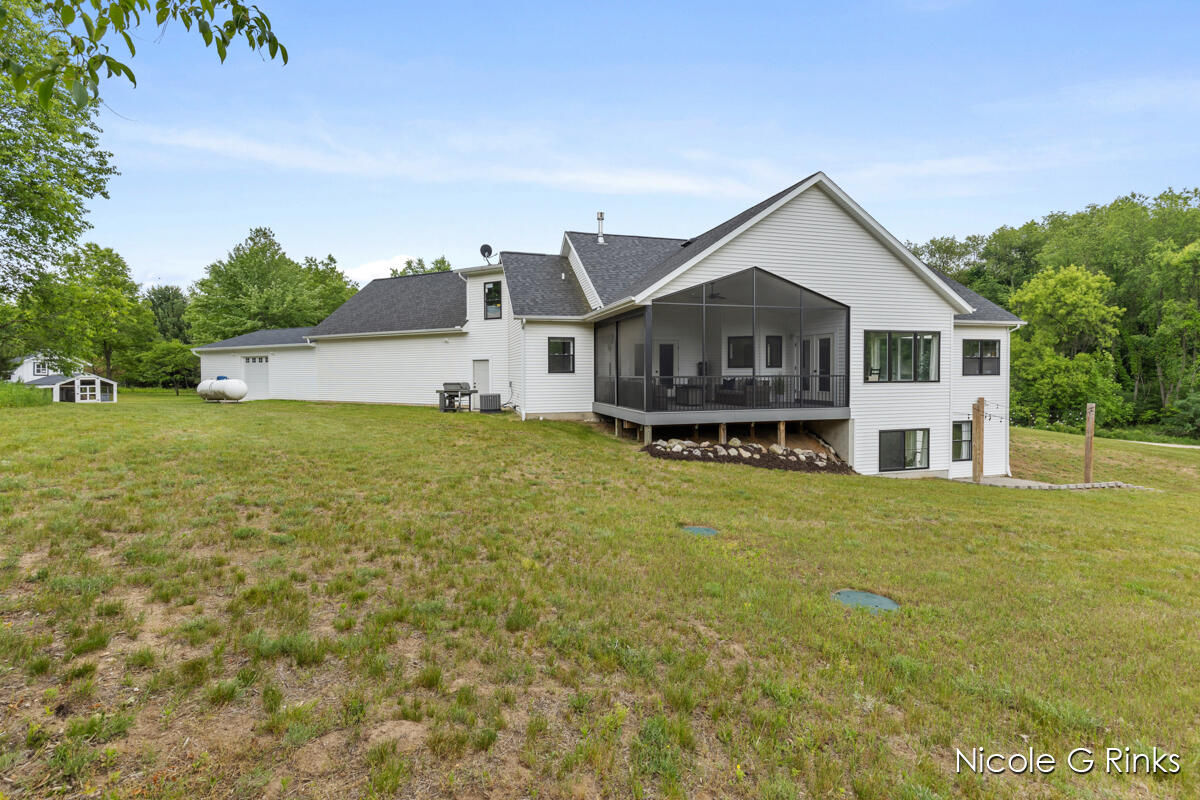 9860 Button Road Belding, MI 48809 - Photo 40 of 63 9860 Button back view