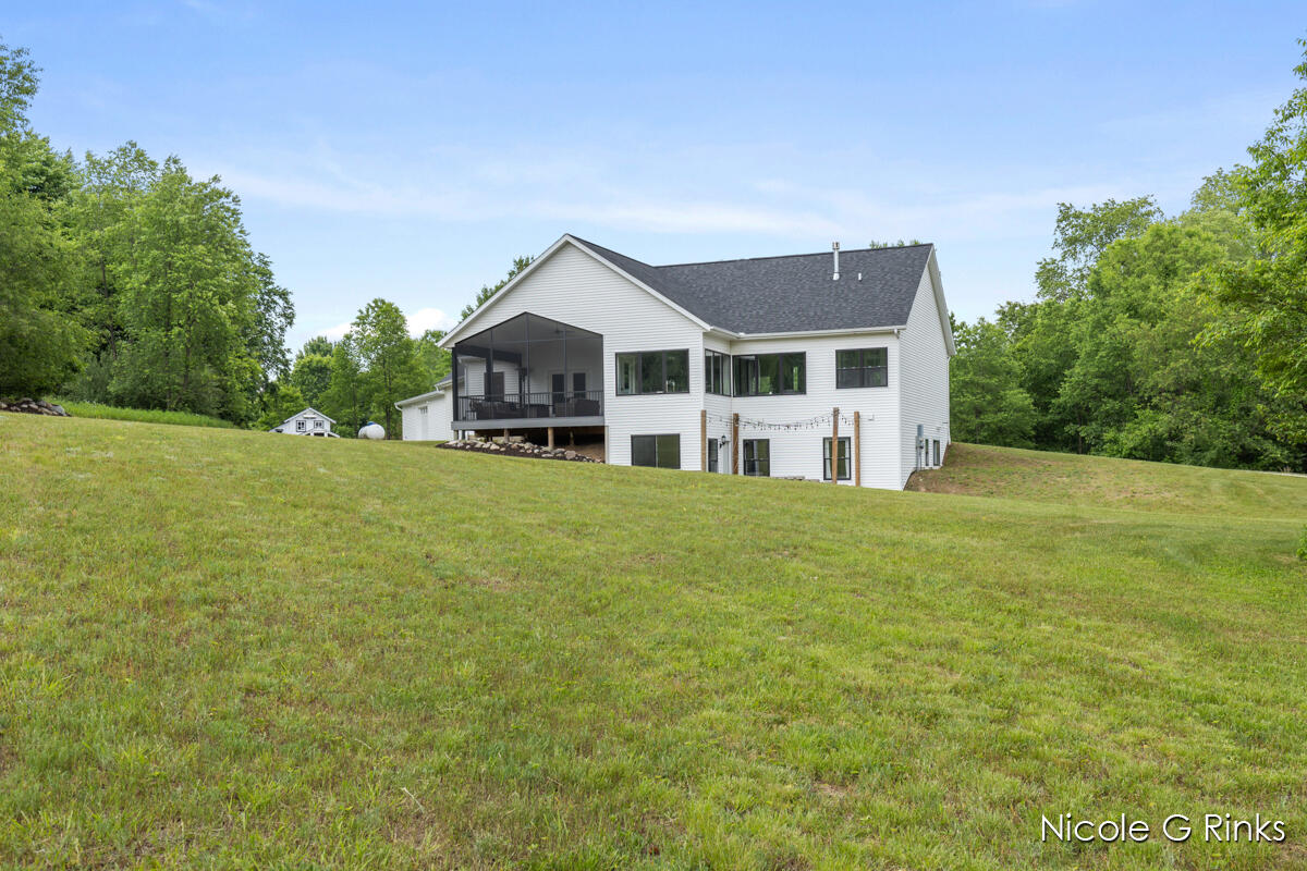 9860 Button Road Belding, MI 48809 - Photo 41 of 63 9860 Button back view