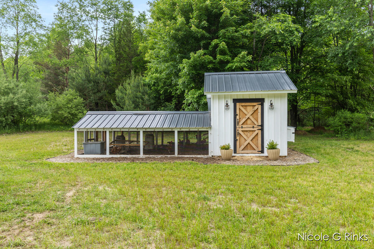 9860 Button Road Belding, MI 48809 - Photo 42 of 63 9860 Button back view