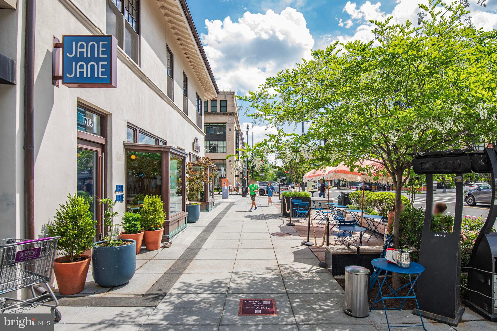 1437 Rhode Island Avenue Northwest, Unit 101 Washington, DC 20005 - Photo 35 of 36 a view of a patio with chairs and potted plants