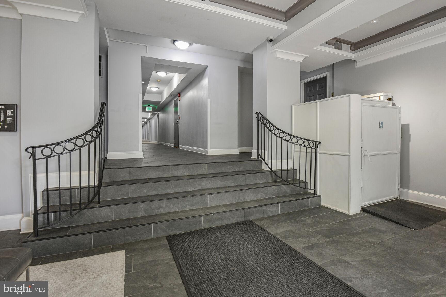 1437 Rhode Island Avenue Northwest, Unit 101 Washington, DC 20005 - Photo 7 of 36 a view of a hallway with staircase