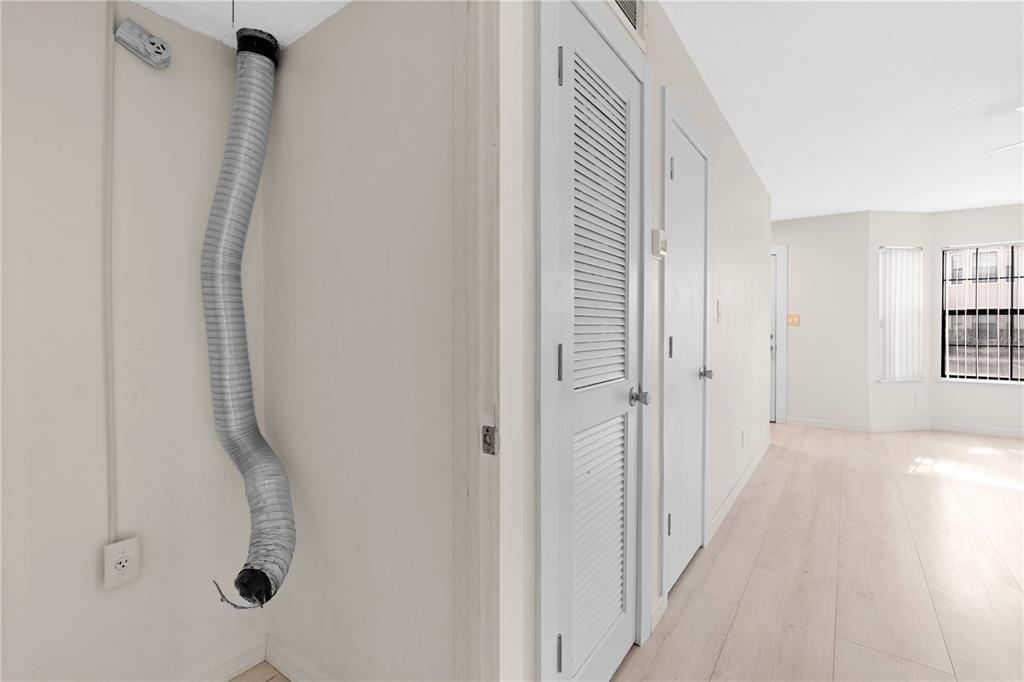 2302 South Maki Road, Unit 66 Plant City, FL 33563 - Photo 12 of 35 a view of a bathroom from a corridor