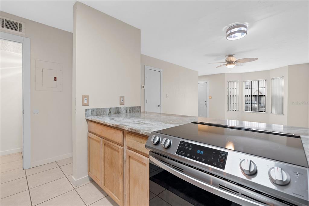 2302 South Maki Road, Unit 66 Plant City, FL 33563 - Photo 18 of 35 a stove top oven sitting inside of a kitchen