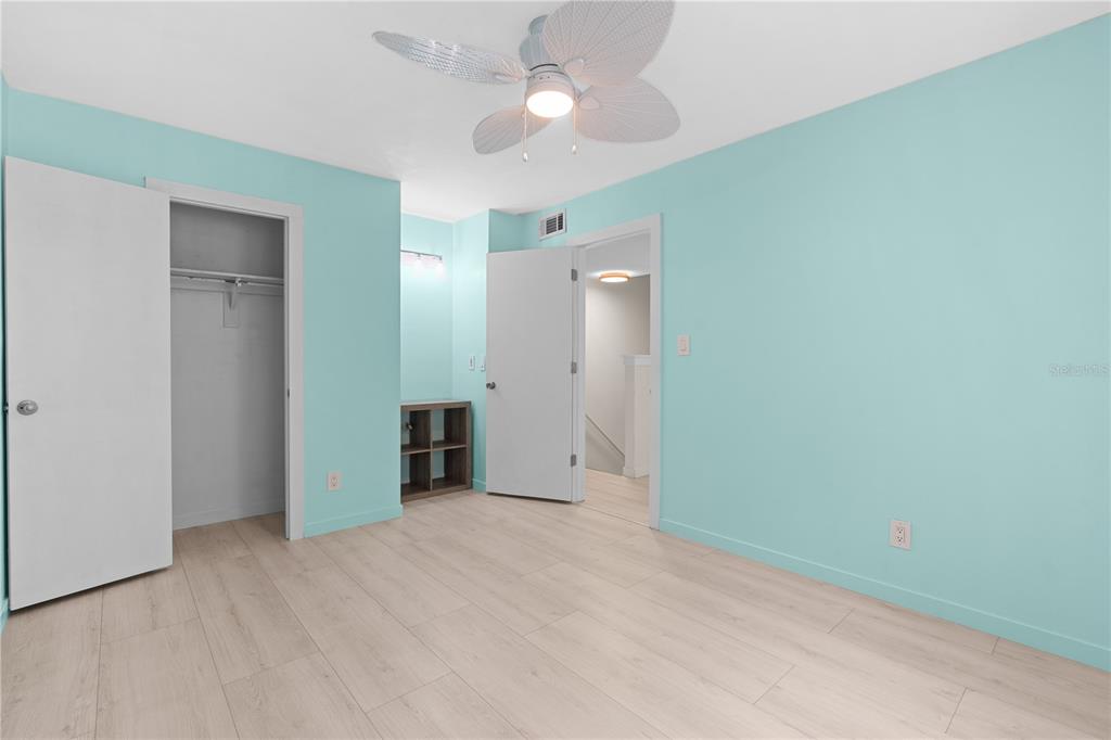 2302 South Maki Road, Unit 66 Plant City, FL 33563 - Photo 25 of 35 an empty room with closet and fan