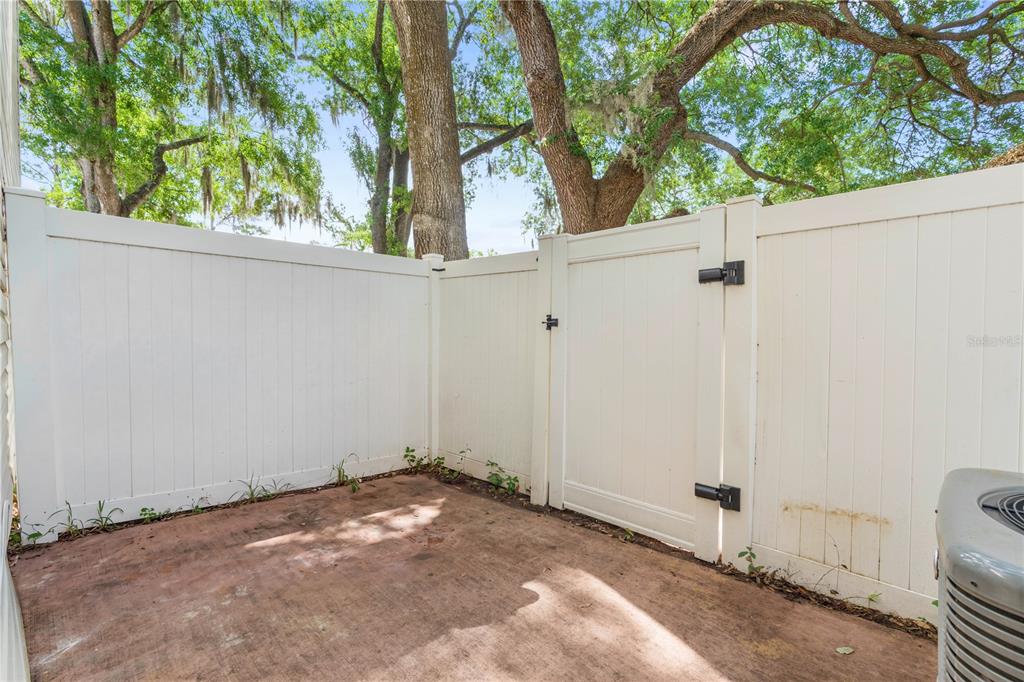 2302 South Maki Road, Unit 66 Plant City, FL 33563 - Photo 27 of 35 a view of a yard with a tree
