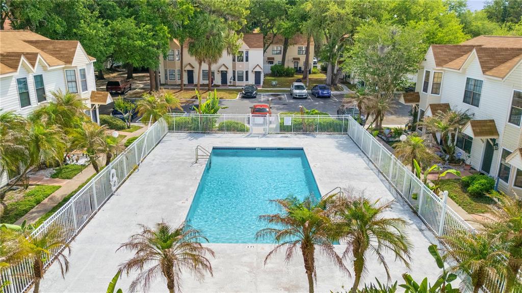 2302 South Maki Road, Unit 66 Plant City, FL 33563 - Photo 29 of 35 a view of yard with swimming pool and sitting area