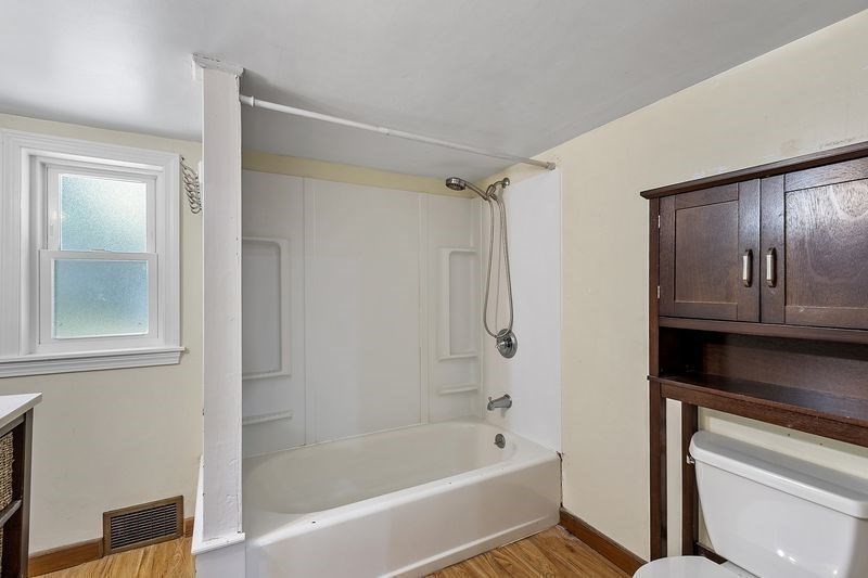 150 Windsor Avenue Swampscott, MA 01907 - Photo 19 of 39 a bathroom with a bathtub and a shower