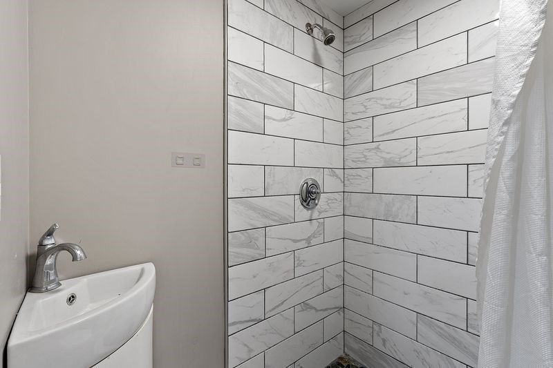 150 Windsor Avenue Swampscott, MA 01907 - Photo 24 of 39 a bathroom with a shower and a sink