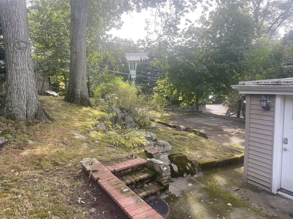 150 Windsor Avenue Swampscott, MA 01907 - Photo 30 of 39 a view of a yard with wooden fence