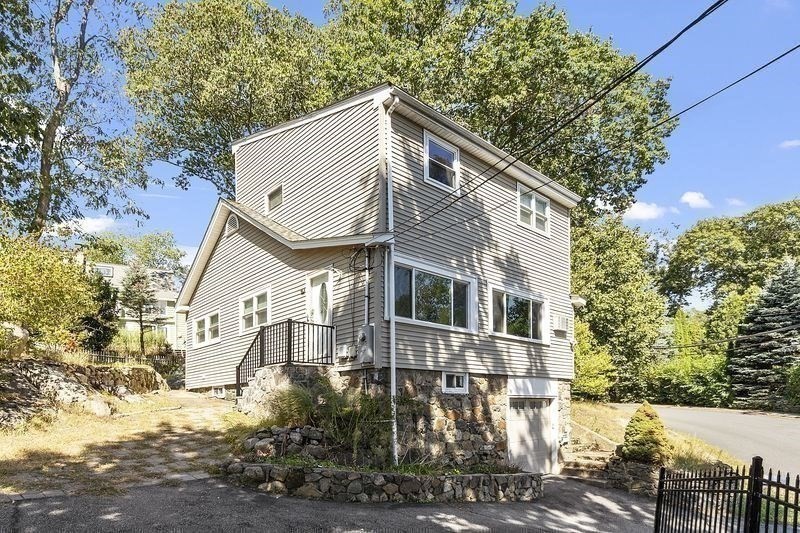 150 Windsor Avenue Swampscott, MA 01907 - Photo 3 of 39 a view of a white building among the street