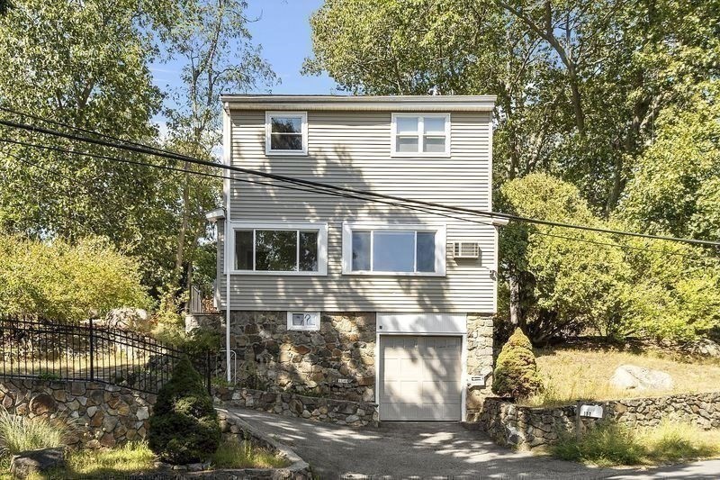 150 Windsor Avenue Swampscott, MA 01907 - Photo 38 of 39 a view of a house with a tree