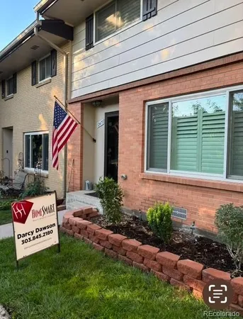 a front view of a house with garage