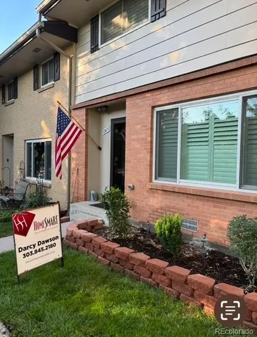 a front view of a house with garage