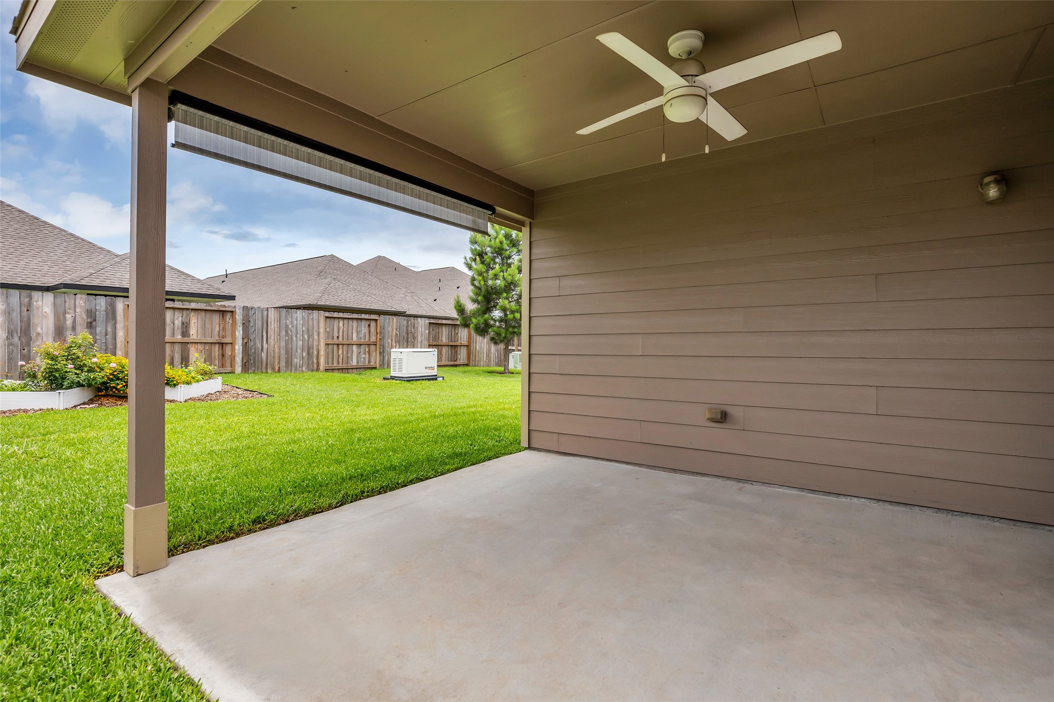 31747 Summit Springs Lane Spring, TX 77386 - Photo 2 of 29 Lovely covered back patio with a vertical sun shade