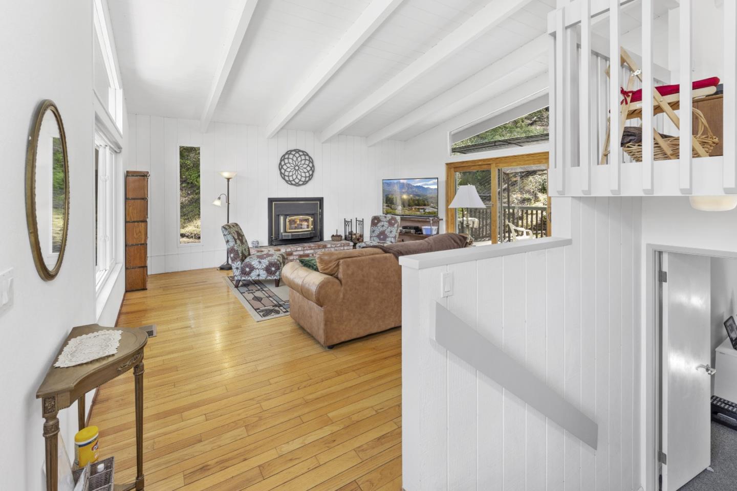 757 Pleasant Valley Road Aptos, CA 95003 - Photo 11 of 41 a living room with furniture and a flat screen tv
