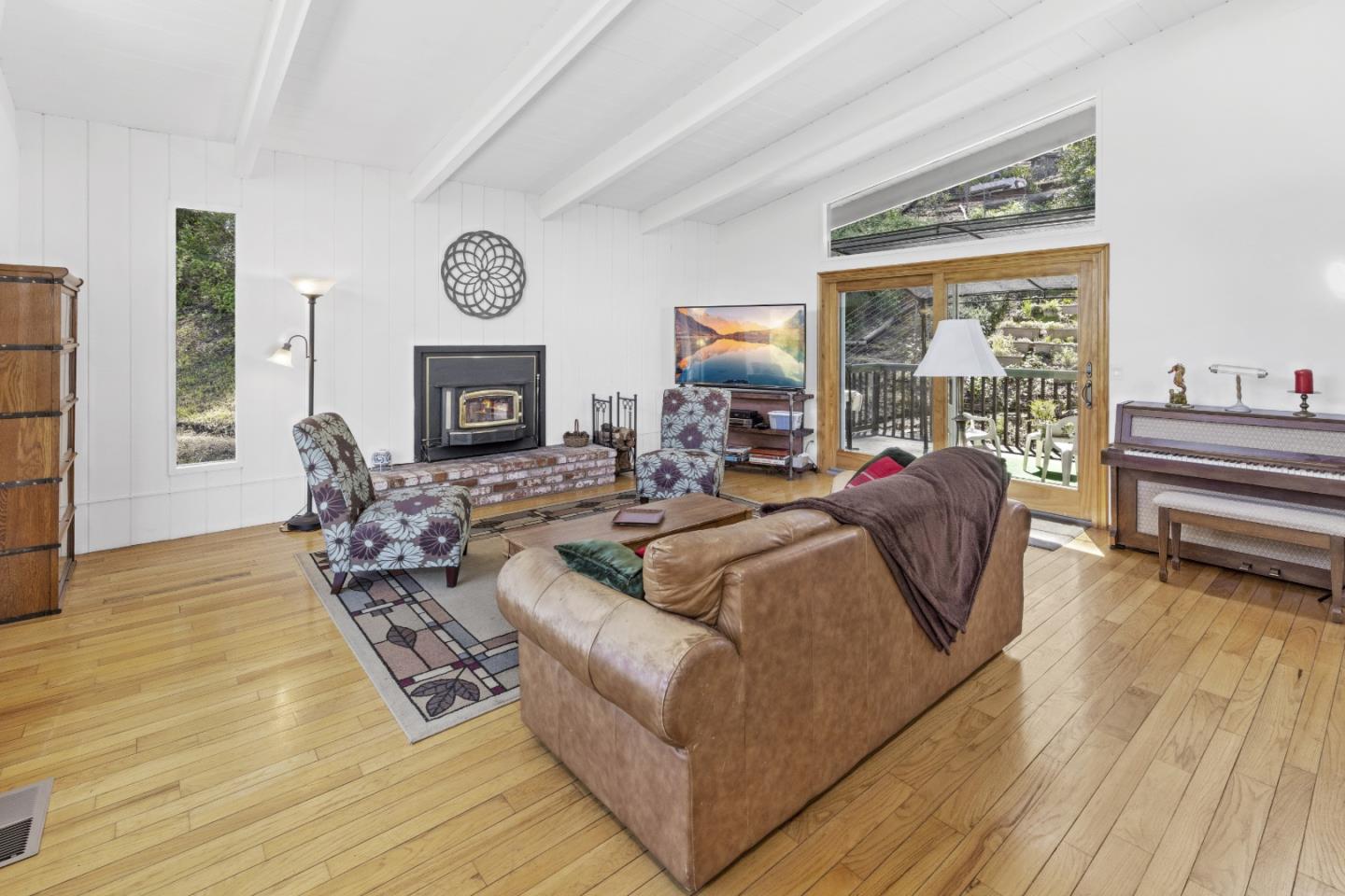 757 Pleasant Valley Road Aptos, CA 95003 - Photo 12 of 41 a living room with furniture and a large window