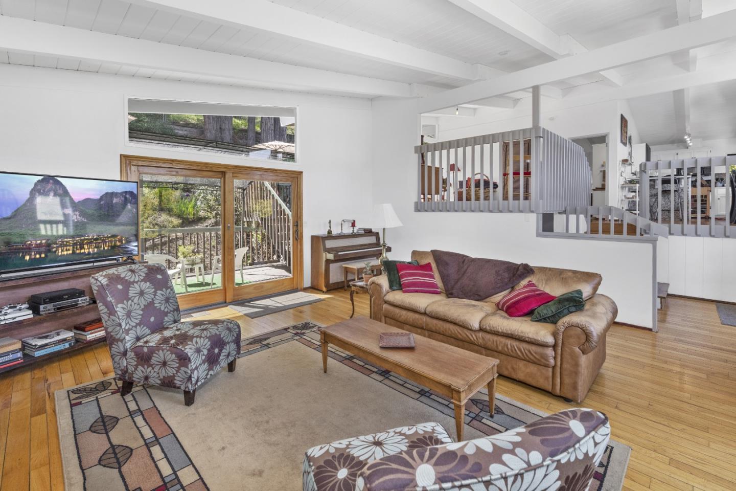 757 Pleasant Valley Road Aptos, CA 95003 - Photo 14 of 41 a living room with furniture and a window