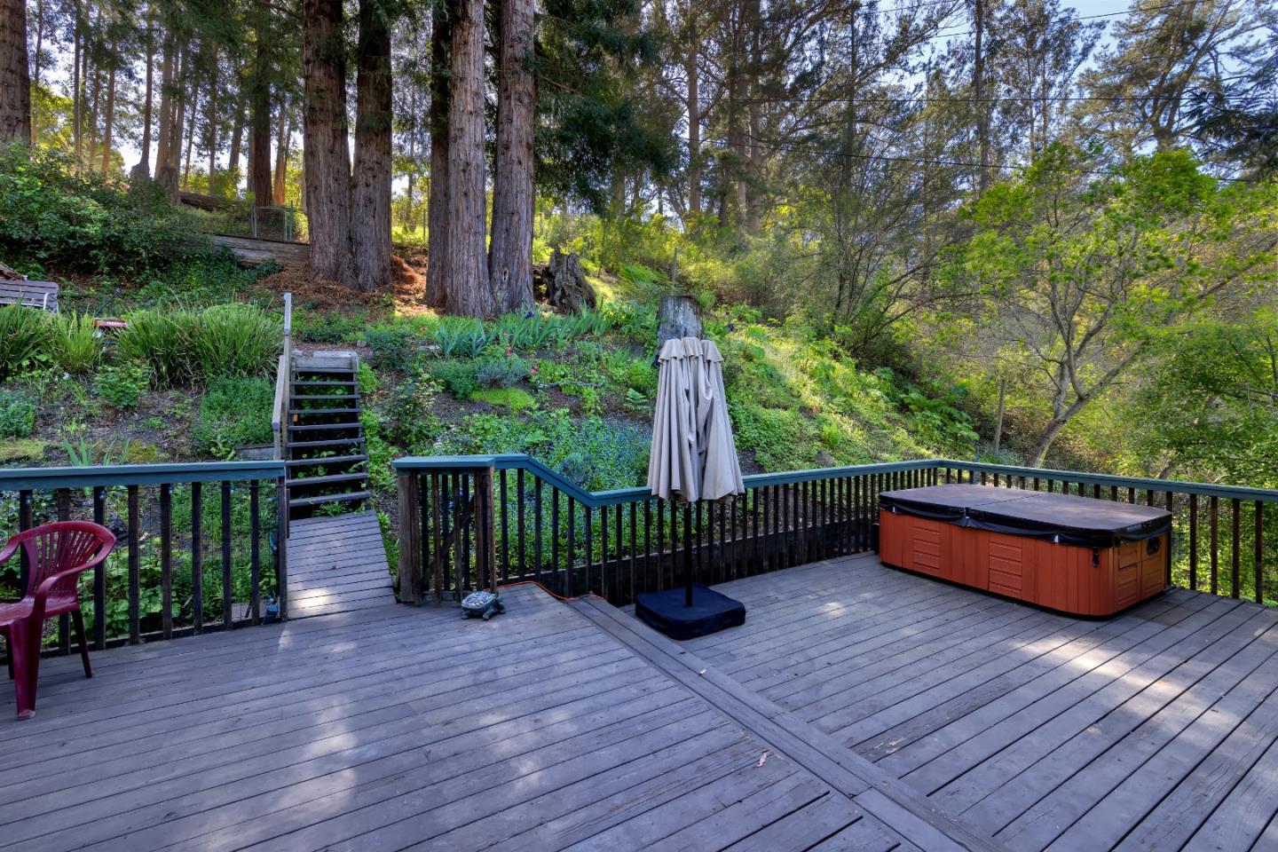 757 Pleasant Valley Road Aptos, CA 95003 - Photo 3 of 41 a view of a deck with mountain view and wooden floor