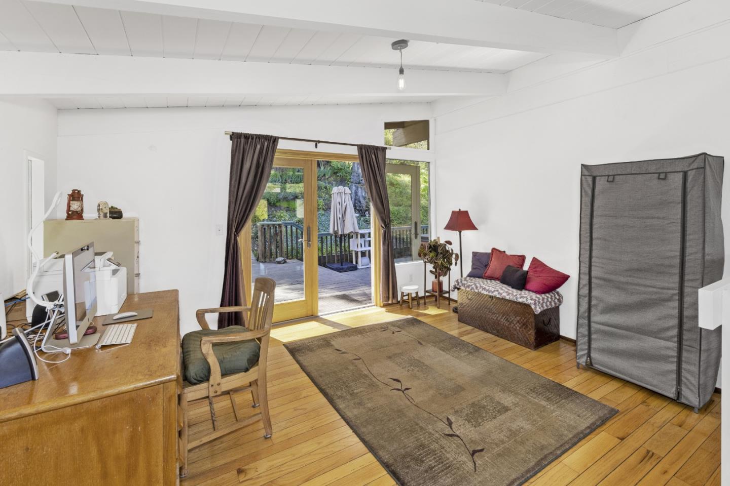 757 Pleasant Valley Road Aptos, CA 95003 - Photo 21 of 41 a living room with furniture and a large window