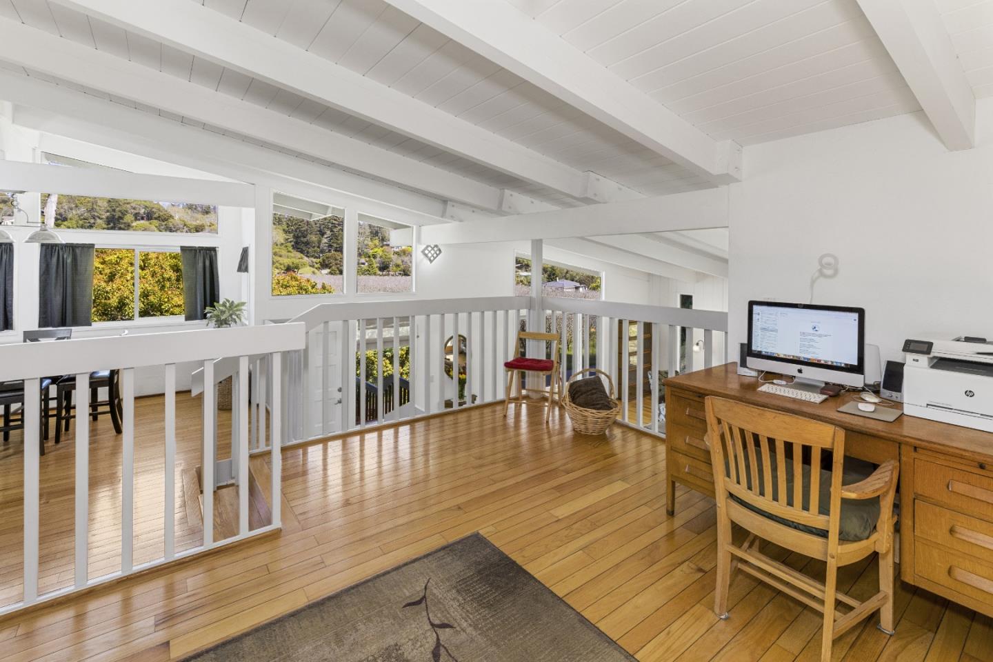 757 Pleasant Valley Road Aptos, CA 95003 - Photo 23 of 41 a living room with furniture and a table