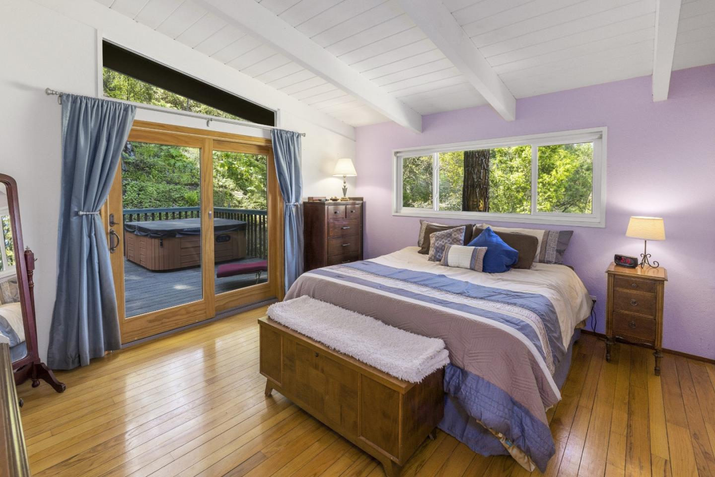 757 Pleasant Valley Road Aptos, CA 95003 - Photo 25 of 41 a bedroom with a bed and a large window