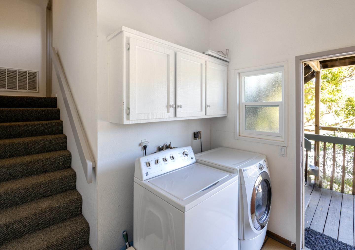 757 Pleasant Valley Road Aptos, CA 95003 - Photo 32 of 41 a utility room with dryer and washer