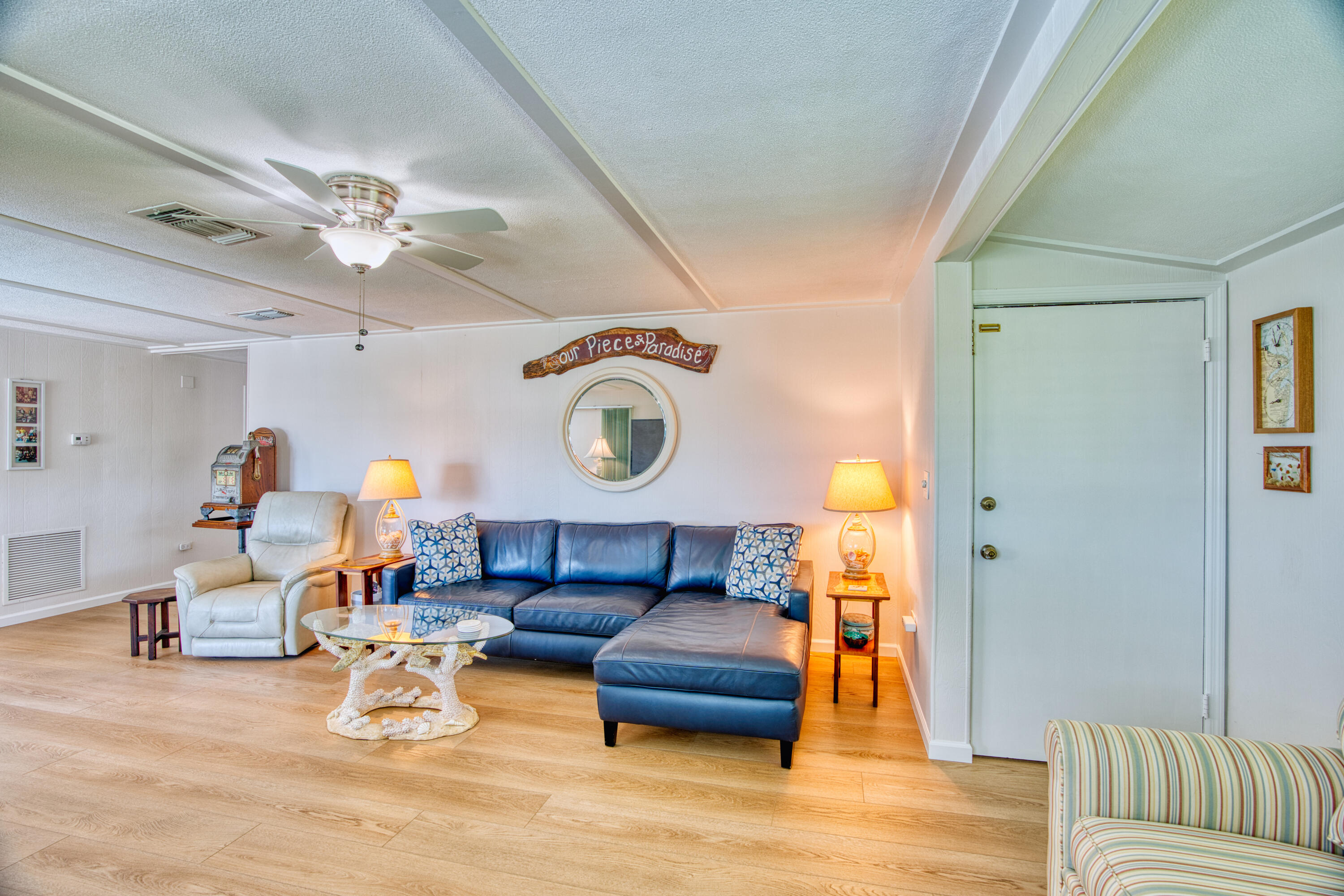 330-340 4th Street Key Colony Beach, FL 33051 - Photo 17 of 68 a living room with furniture and a chandelier