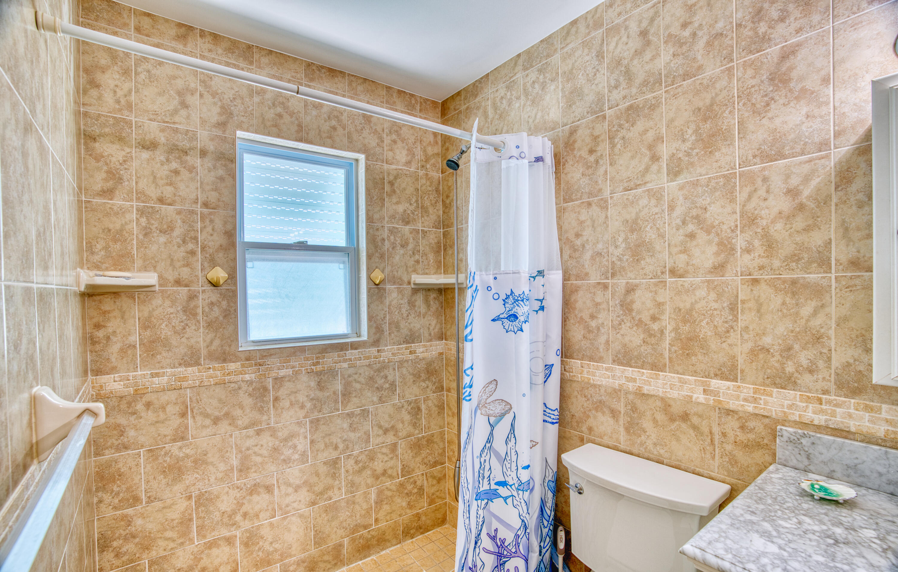330-340 4th Street Key Colony Beach, FL 33051 - Photo 29 of 68 a bathroom with a shower and a toilet