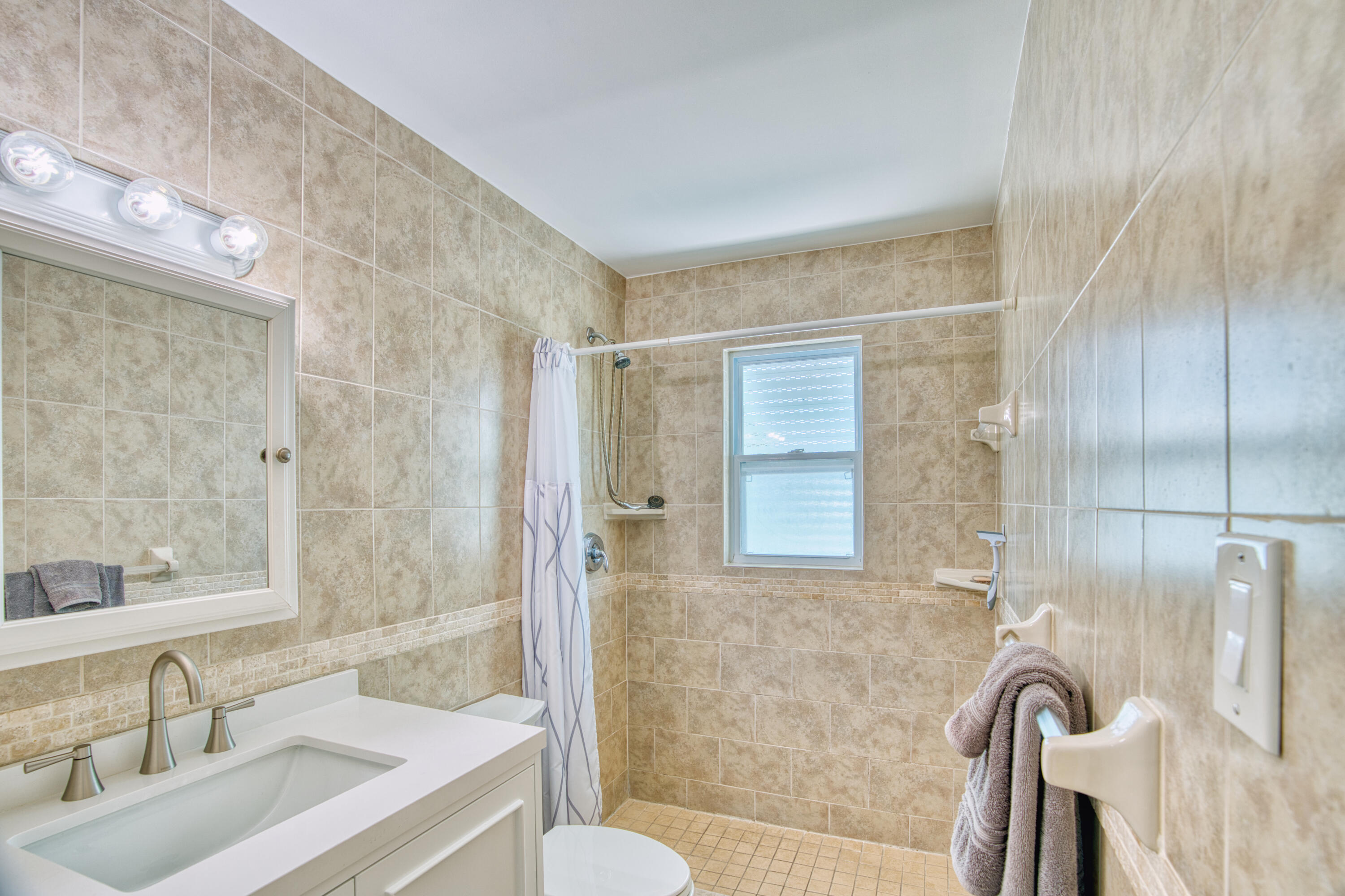 330-340 4th Street Key Colony Beach, FL 33051 - Photo 34 of 68 a bathroom with a bathtub and a sink
