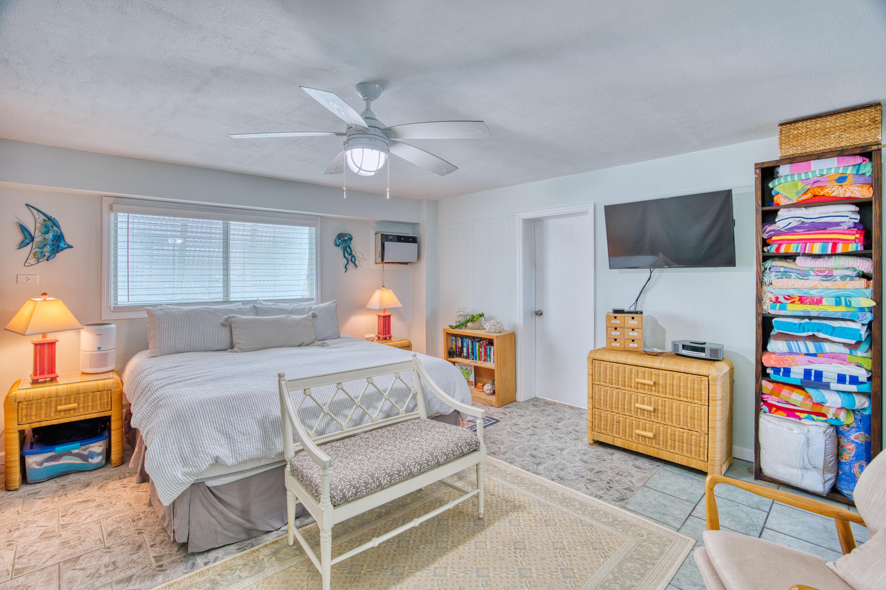330-340 4th Street Key Colony Beach, FL 33051 - Photo 44 of 68 a bedroom with a bed and a tv in it