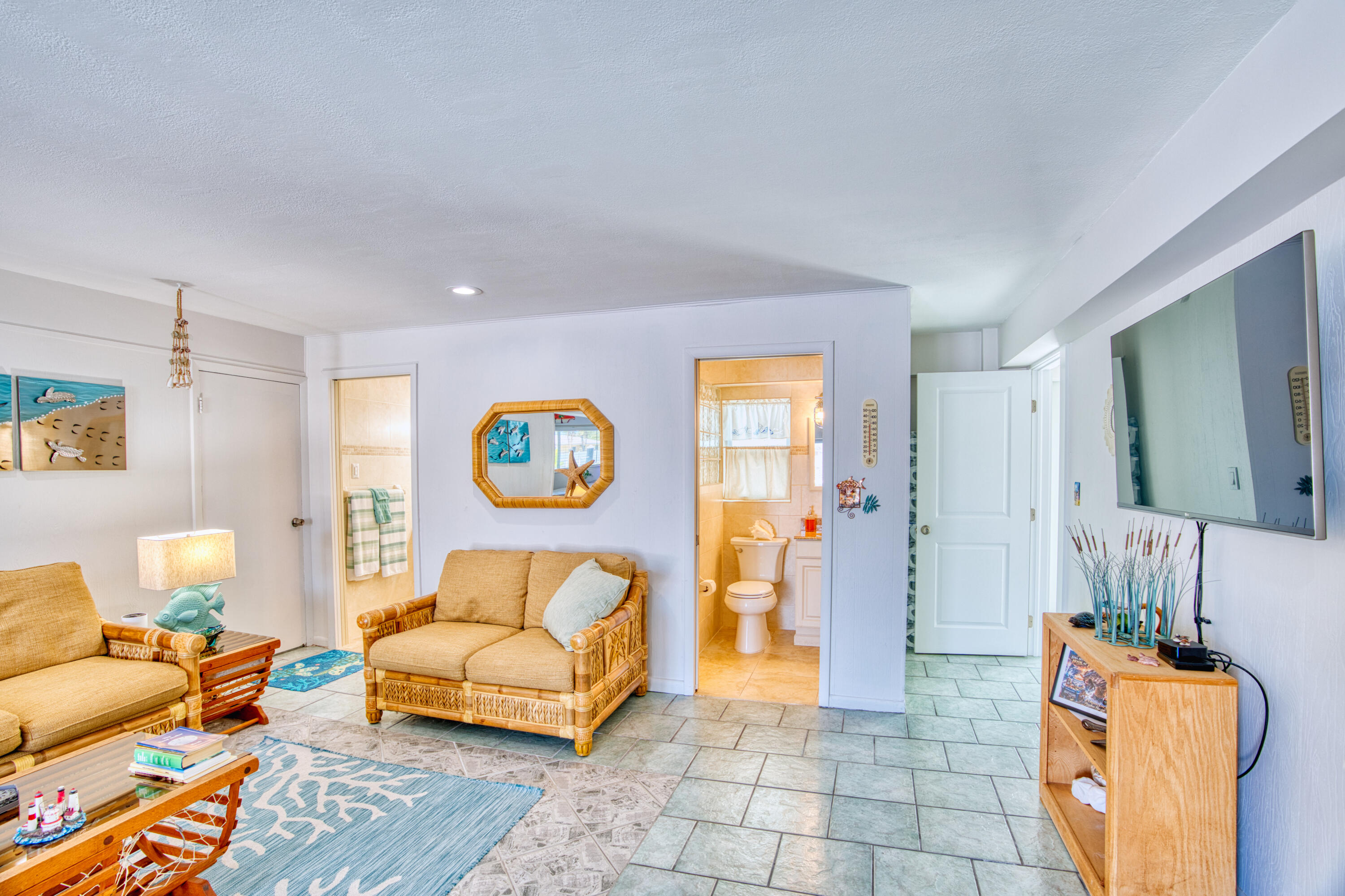 330-340 4th Street Key Colony Beach, FL 33051 - Photo 46 of 68 a living room with furniture and a couch