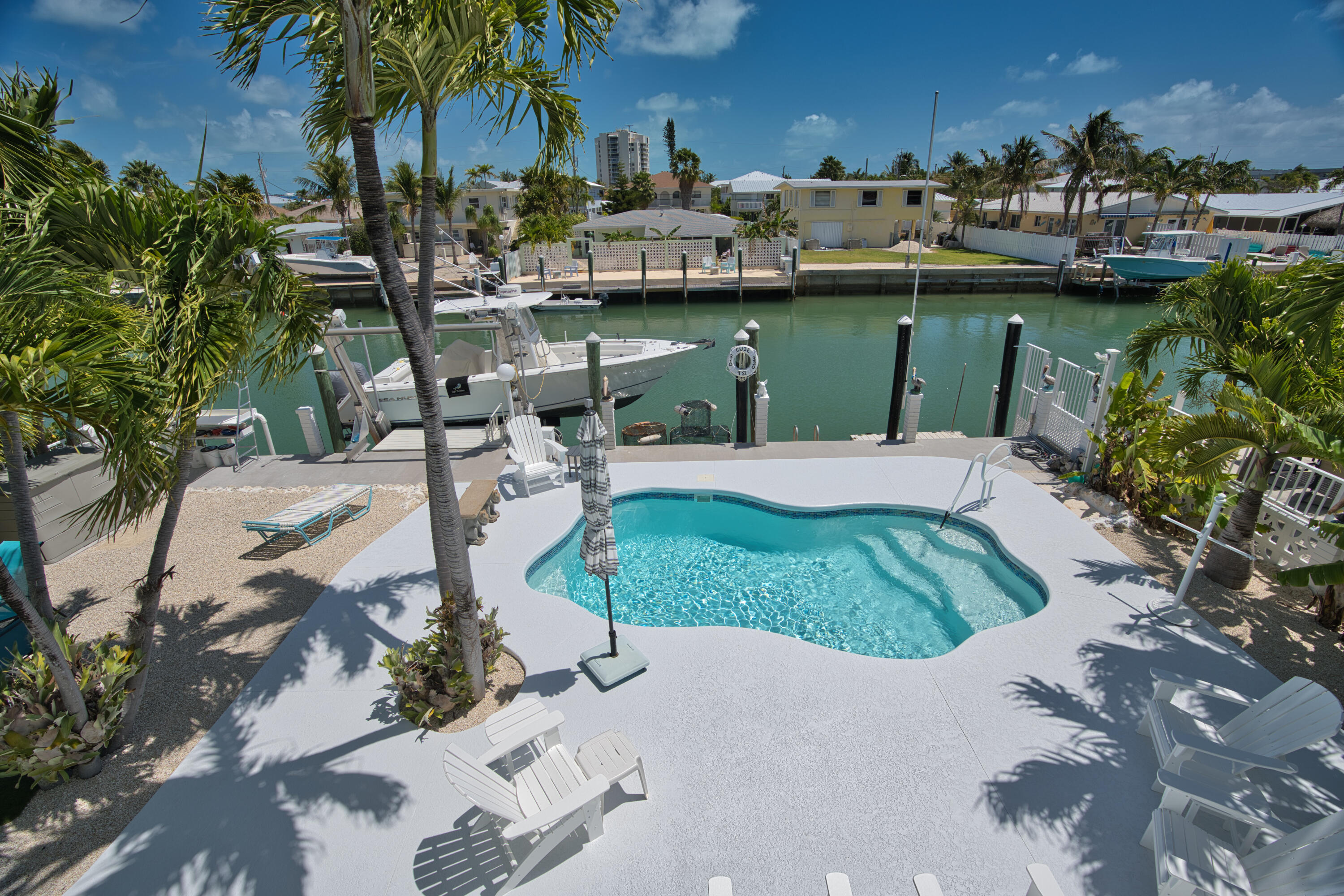 330-340 4th Street Key Colony Beach, FL 33051 - Photo 8 of 68 a view of a house with a yard and lake view