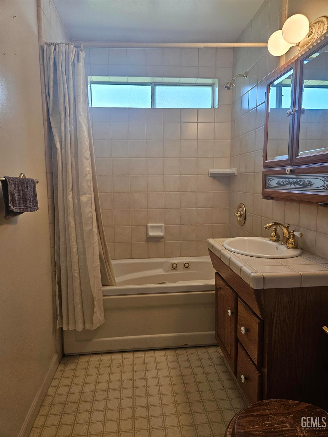 Undisclosed Address Bakersfield, CA 93306 - Photo 16 of 27 a bathroom with a sink a toilet and a bathtub