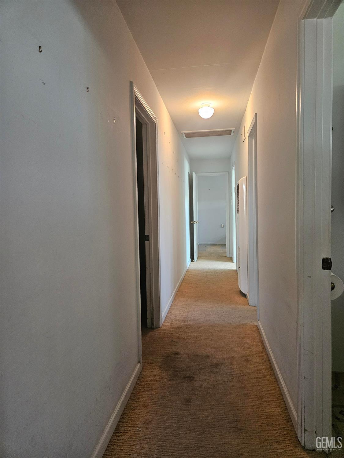 Undisclosed Address Bakersfield, CA 93306 - Photo 17 of 27 a view of hallway with closet