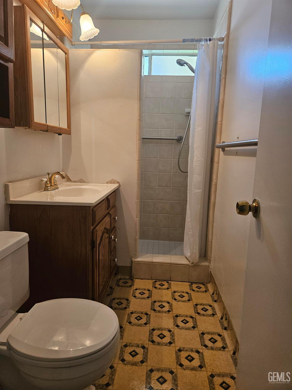 Undisclosed Address Bakersfield, CA 93306 - Photo 18 of 27 a bathroom with a sink toilet and shower