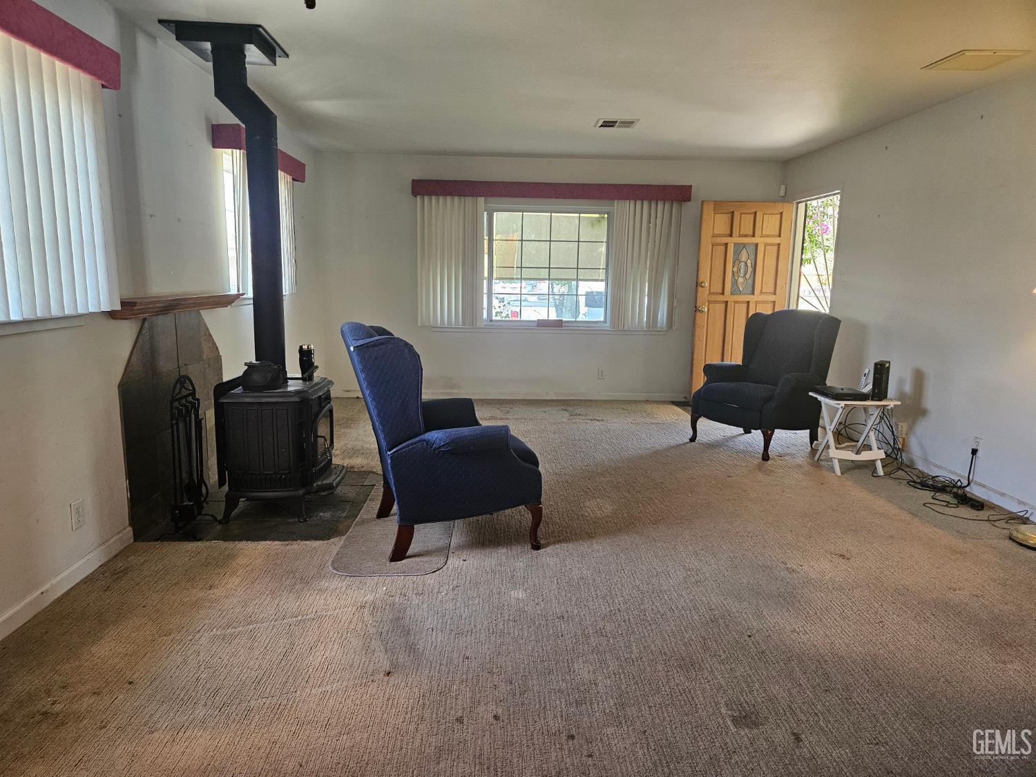 Undisclosed Address Bakersfield, CA 93306 - Photo 5 of 27 a living room with furniture and a window
