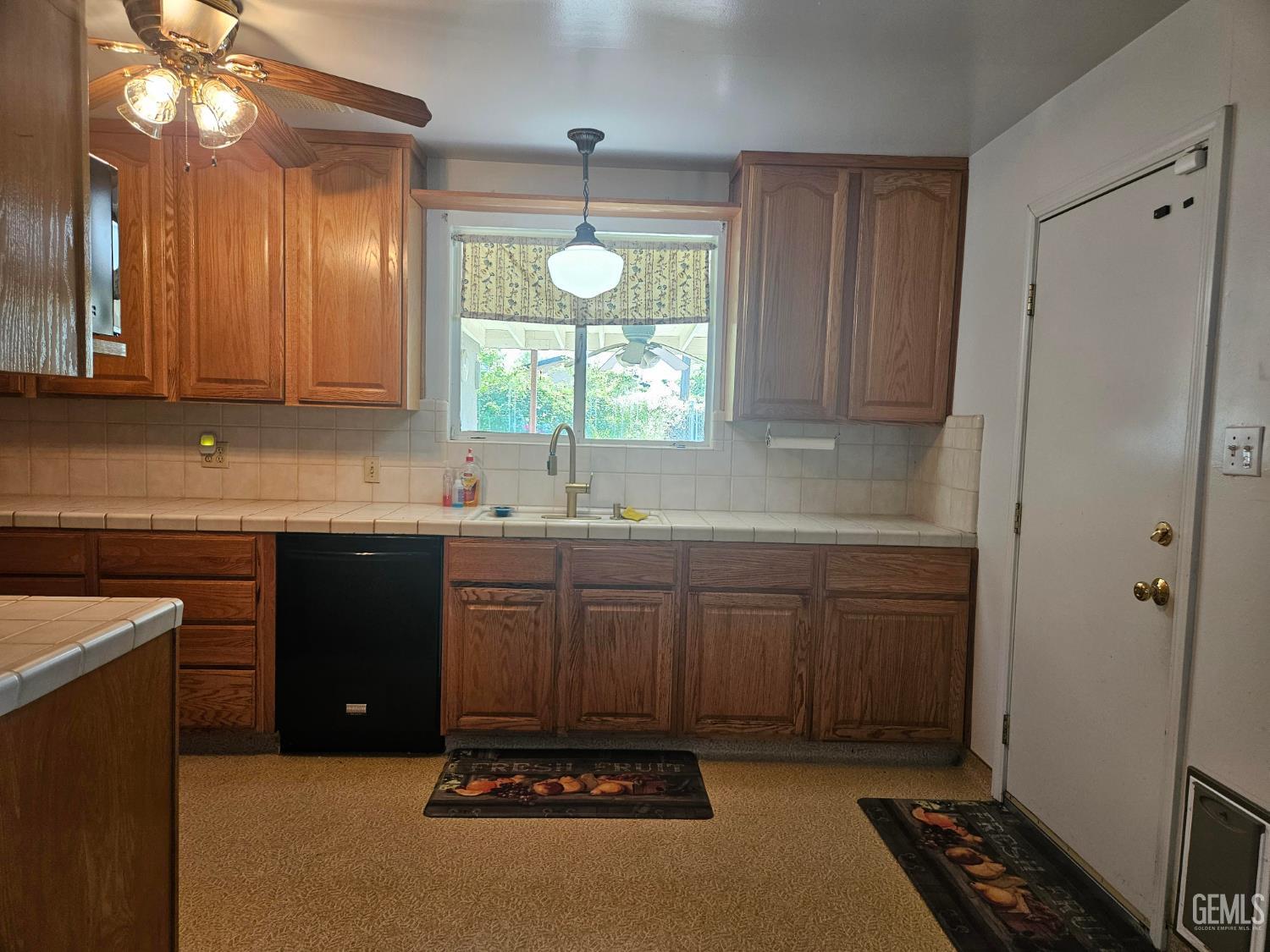 Undisclosed Address Bakersfield, CA 93306 - Photo 9 of 27 a kitchen with a sink cabinets and window